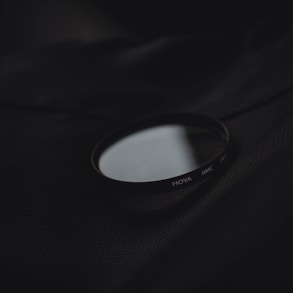 a close up of a lens on a black background