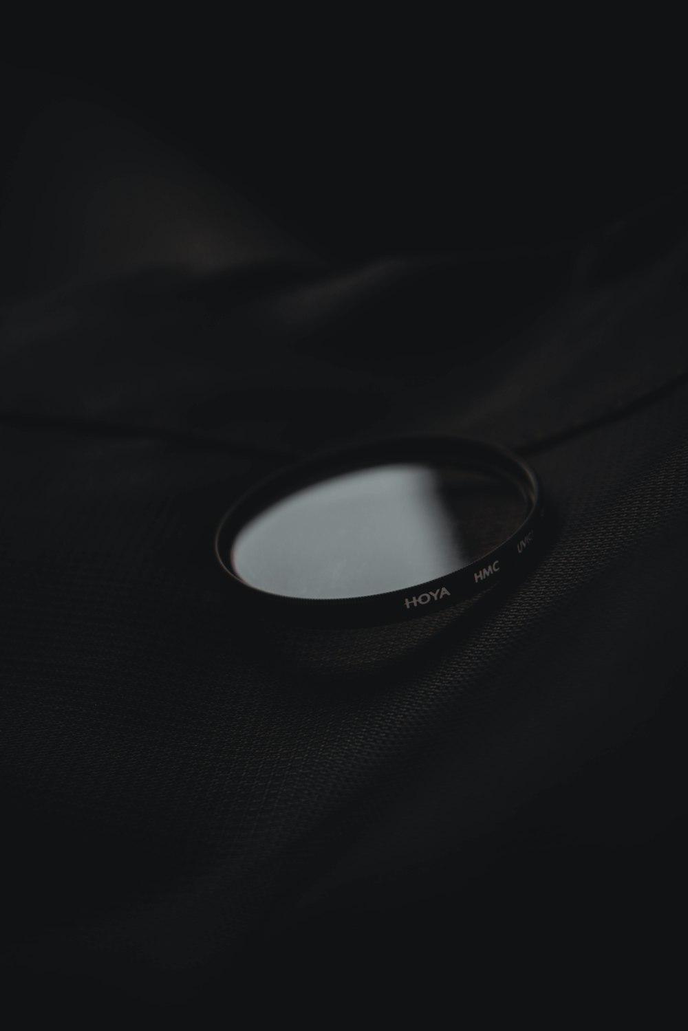 a close up of a lens on a black background