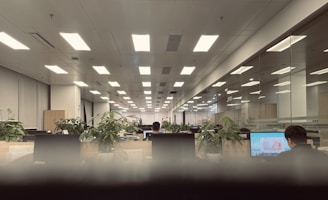 a man sitting at a desk in an office