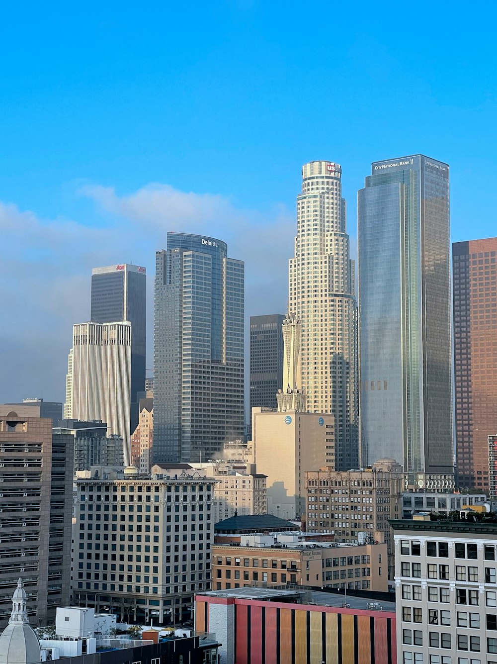 a view of a city with tall buildings