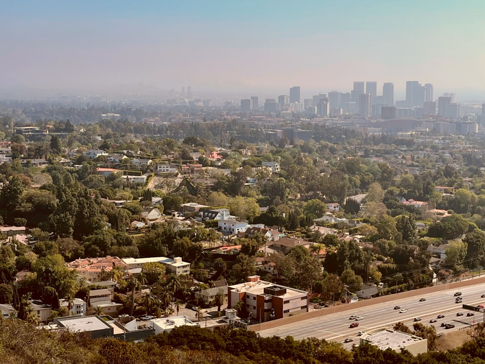 a view of a city from the top of a hill