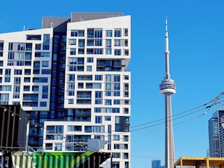 a view of a very tall building in the city