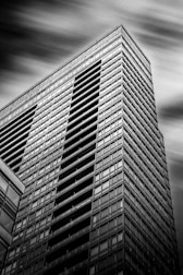 a black and white photo of a tall building