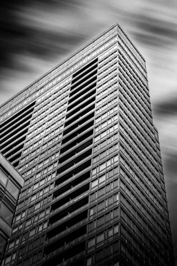 a black and white photo of a tall building