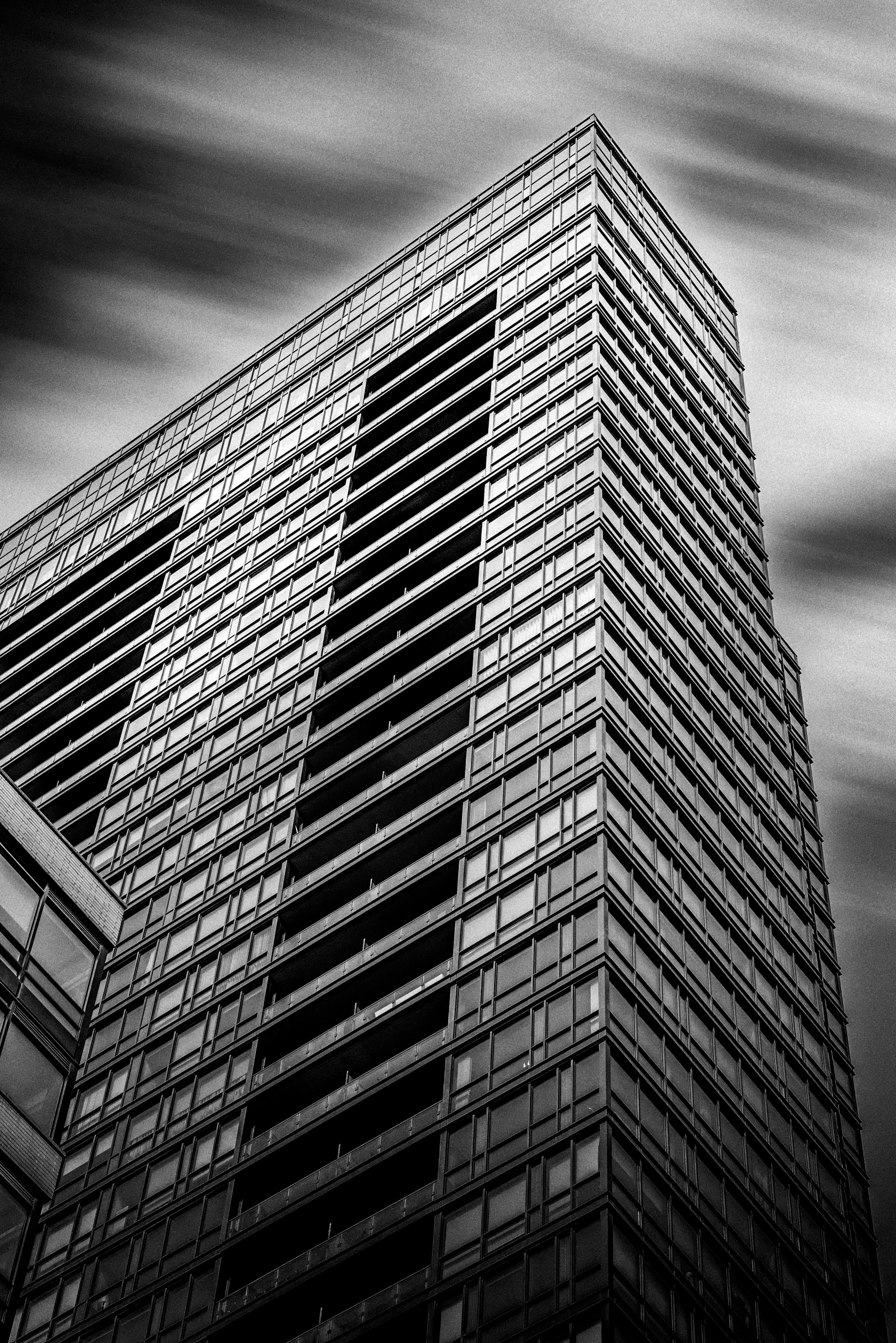 a black and white photo of a tall building