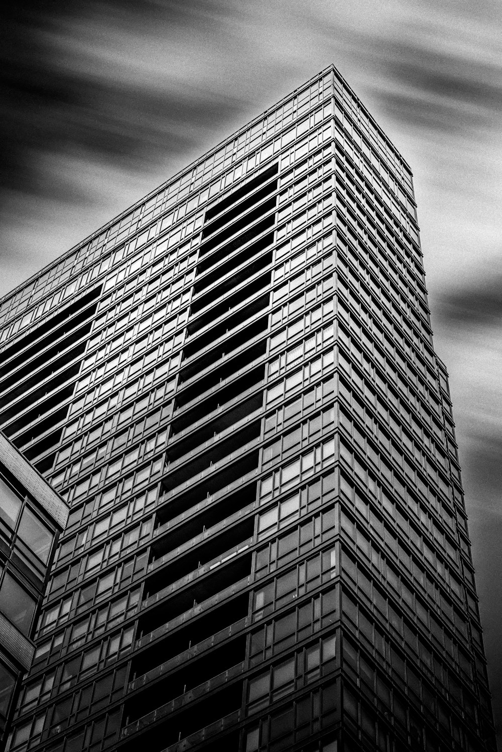 a black and white photo of a tall building