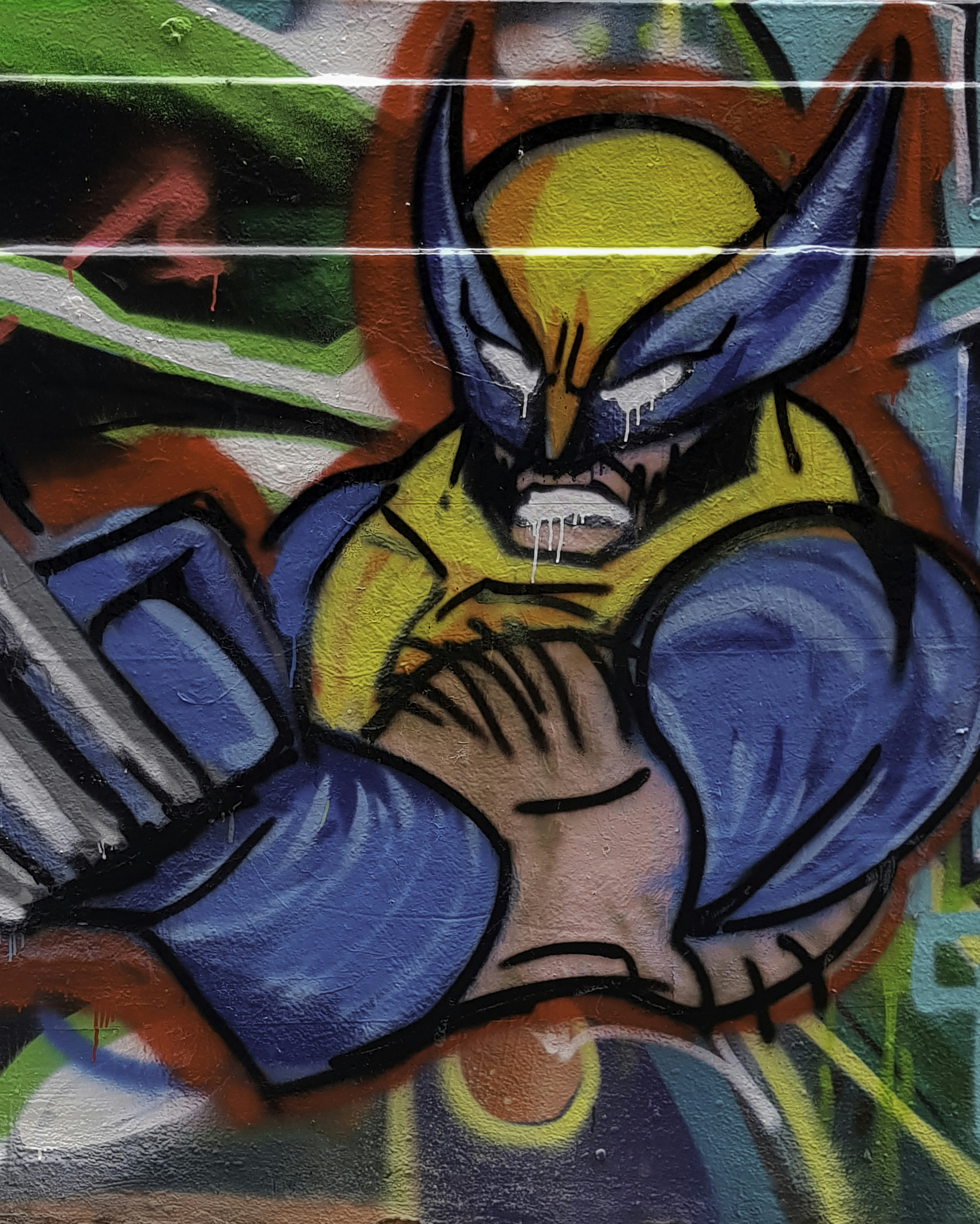 a graffiti painting of a man holding a knife
