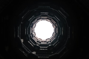 a view of the inside of a dark tunnel