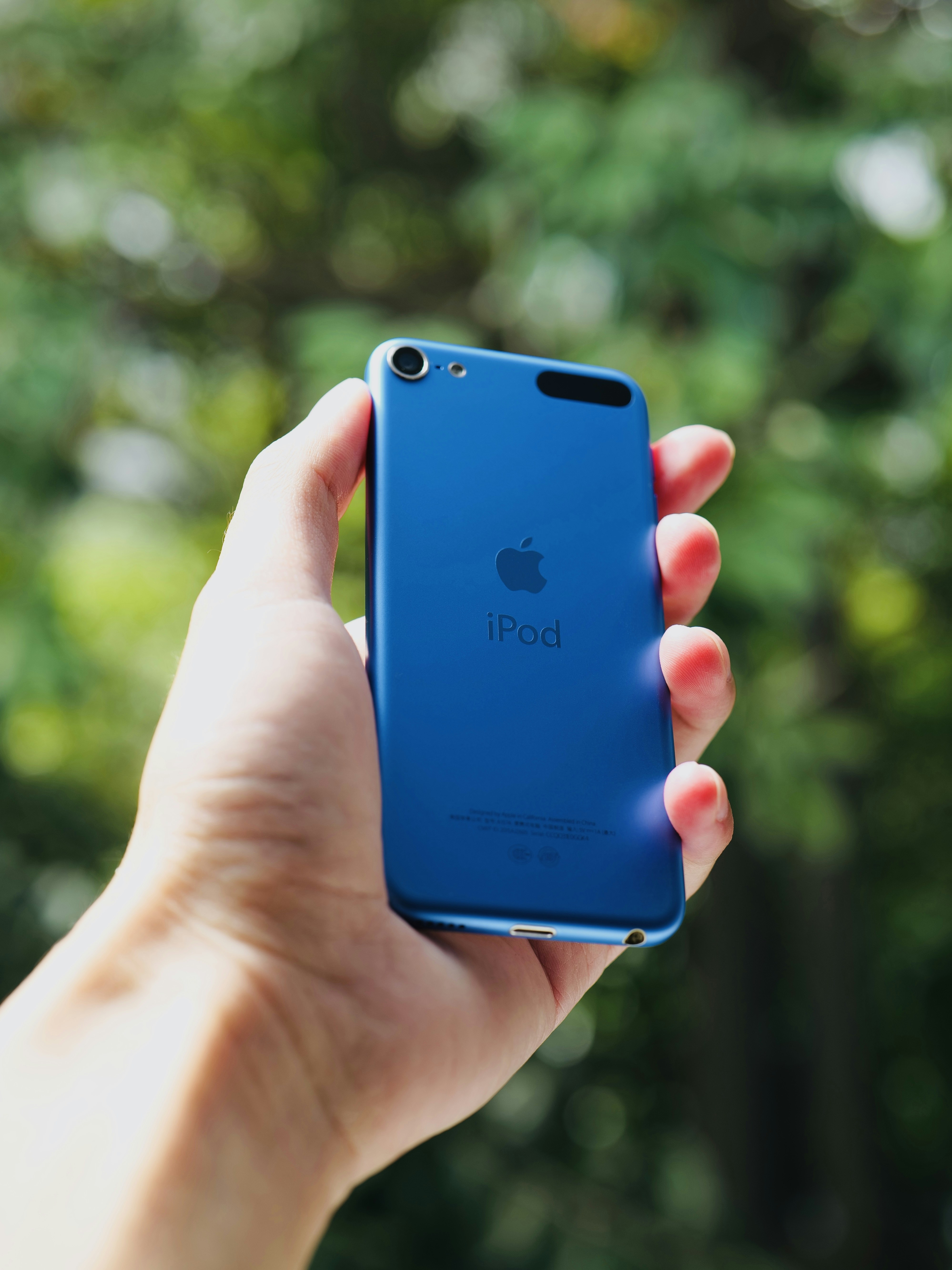 woman wearing yellow long-sleeved dress under white clouds and blue sky during daytime