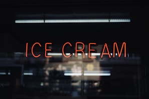 a neon sign that reads ice cream