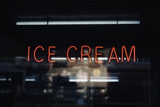 a neon sign that reads ice cream