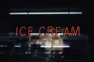 a neon sign that reads ice cream