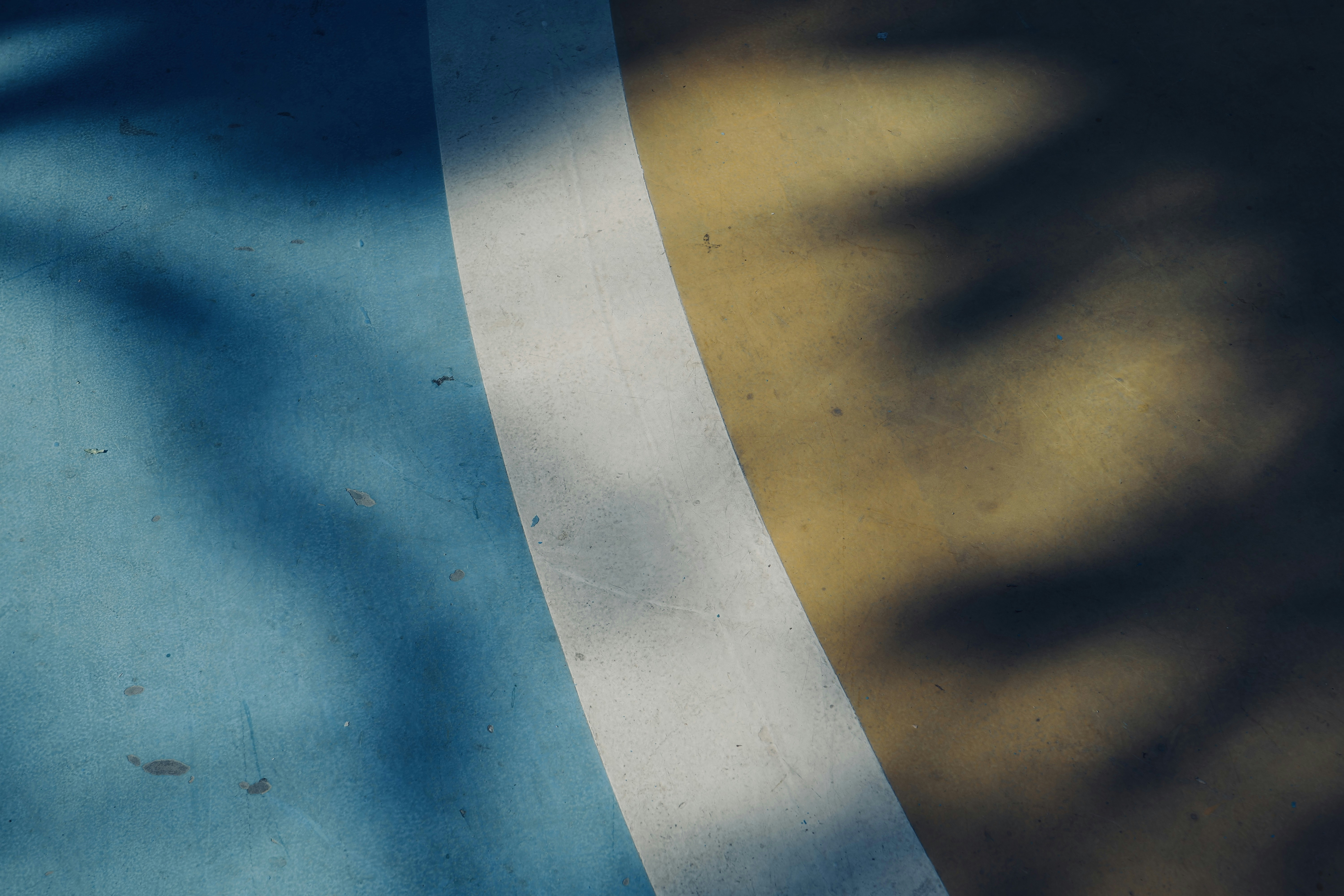 a skateboarder doing a trick on a half pipe