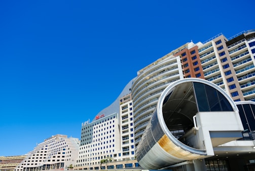 A welcoming virtual tour interface showing a 360-degree photo of the complex's main entrance.