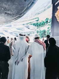 a group of people standing next to each other