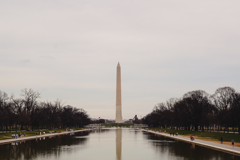 the washington monument and reflecting pool of water