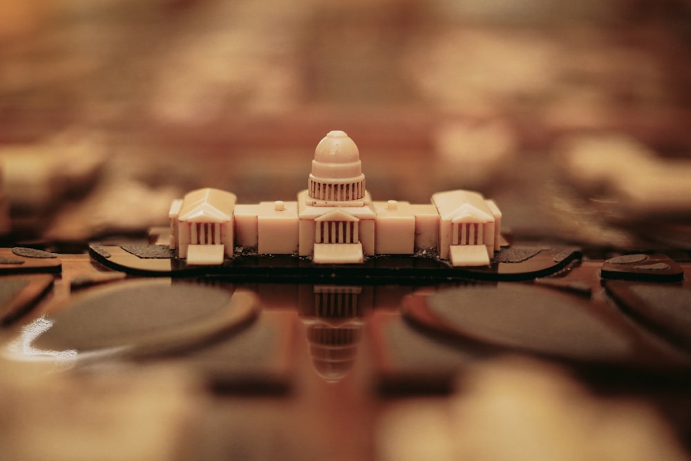 a close up of a model of a building on a table