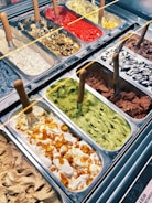 a display case filled with different types of ice cream