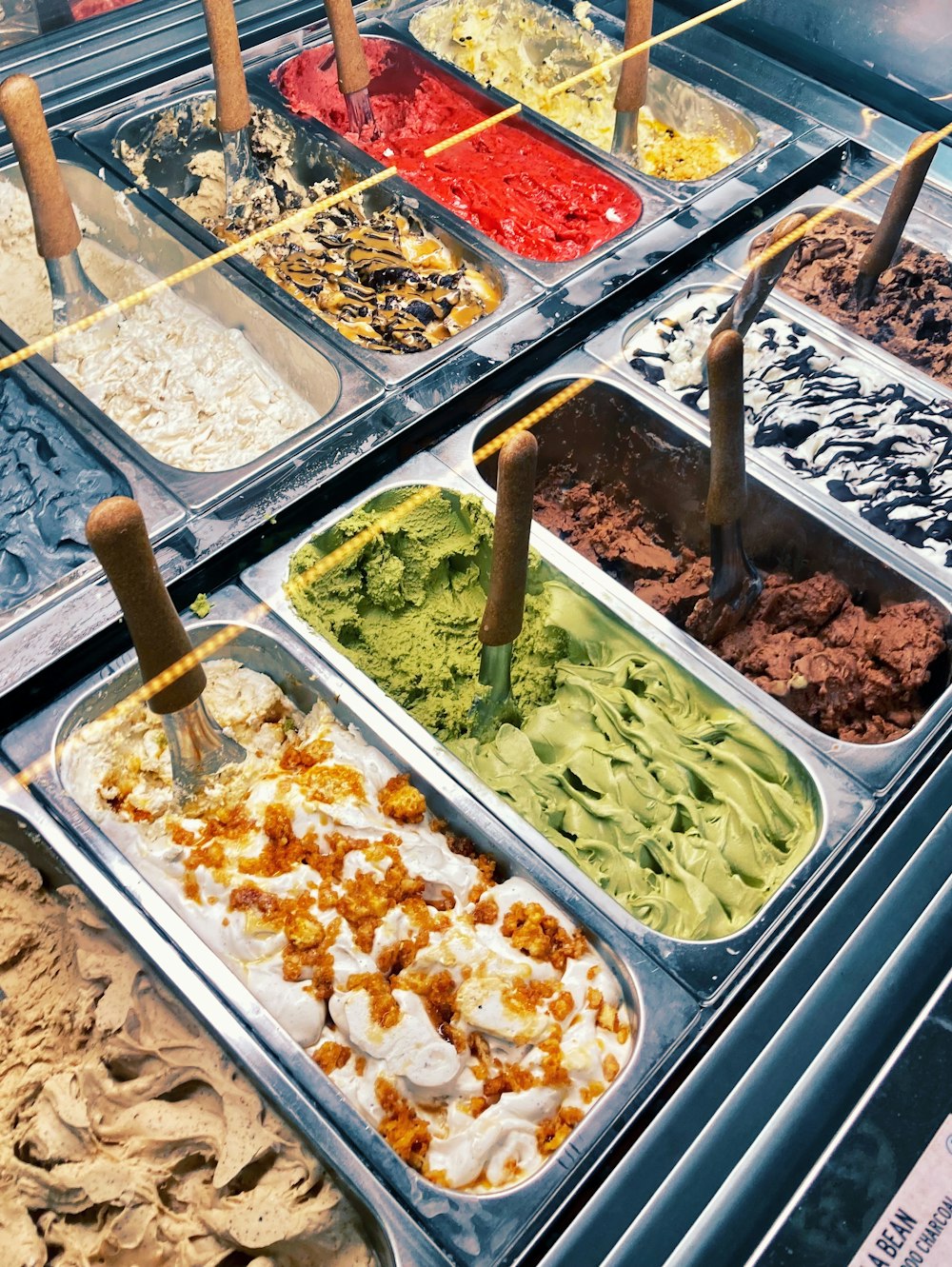 a display case filled with different types of ice cream