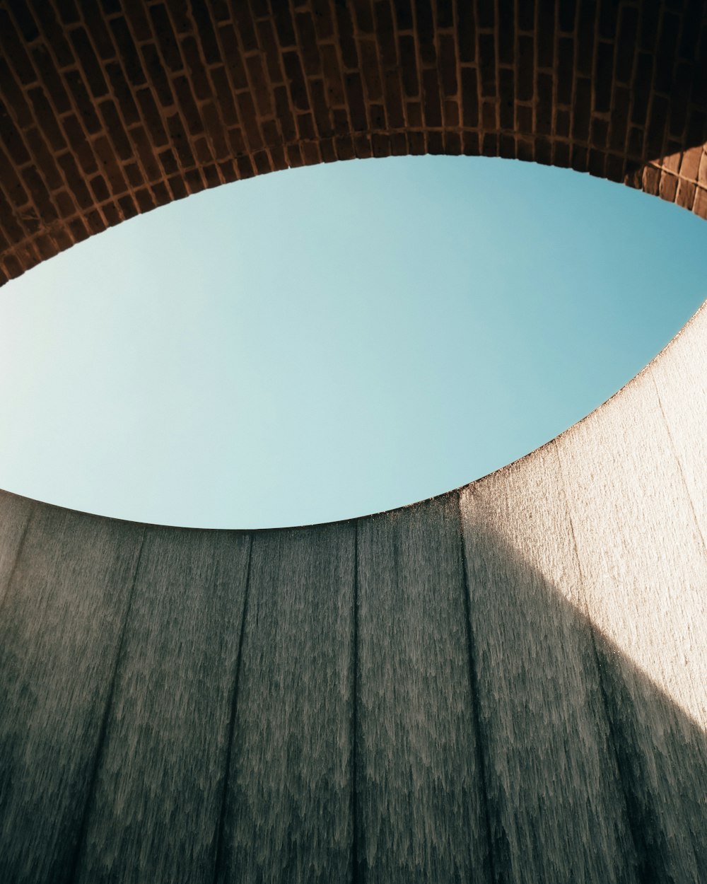 a skateboarder is doing a trick on a ramp