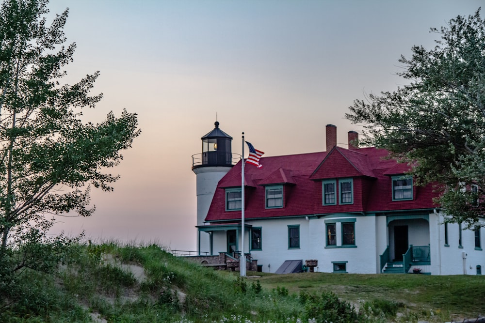 a large white house with a red roof