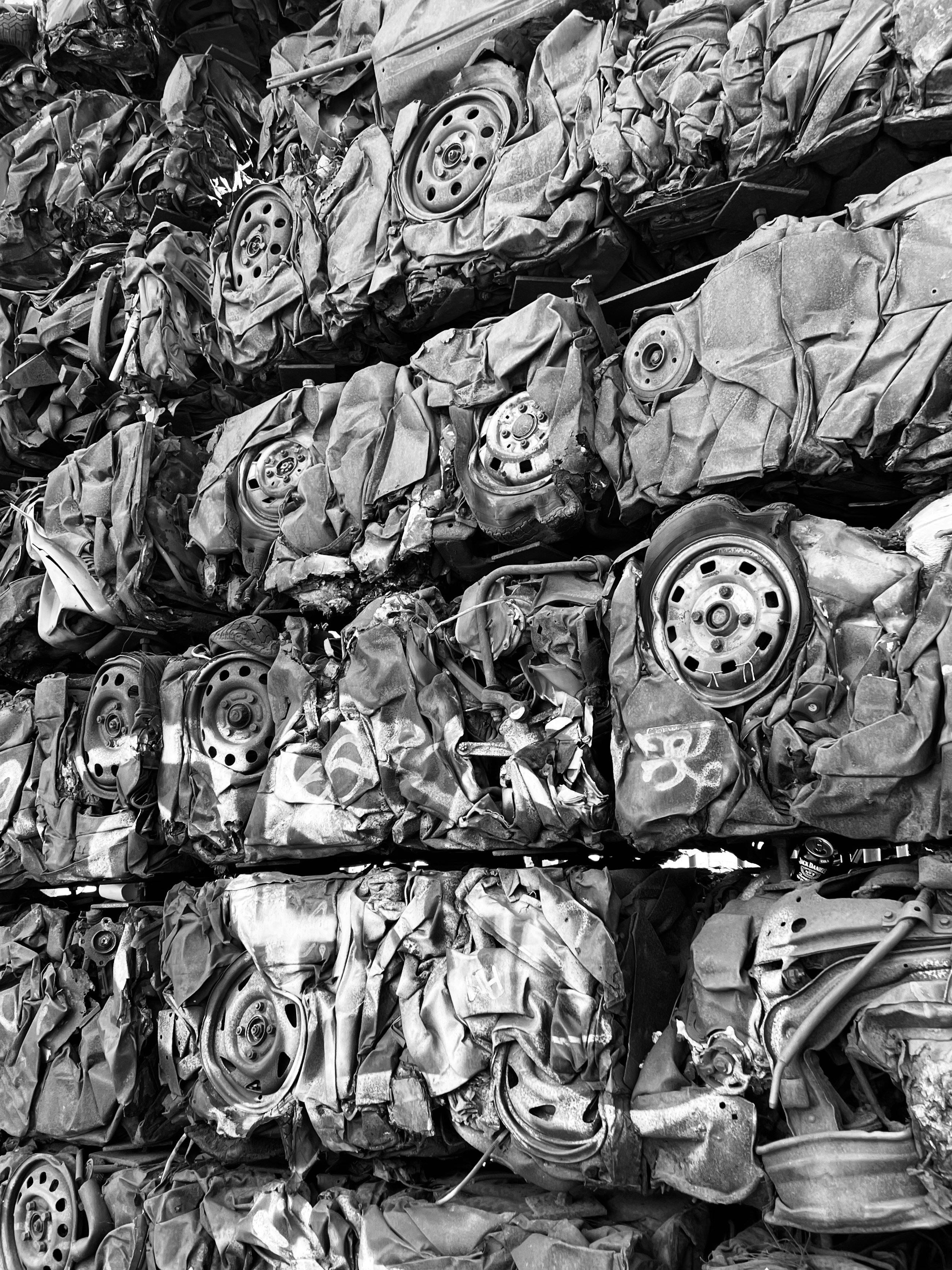 A black and white photo of a rack of shoes