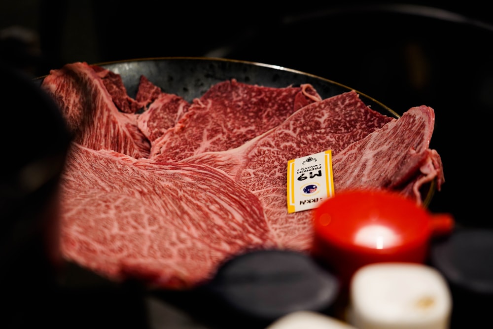 a bunch of raw meat in a bowl