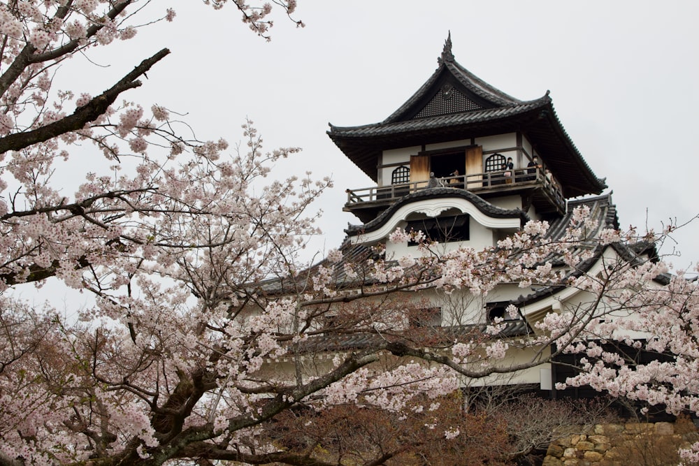 a tall tower with a clock on top of it