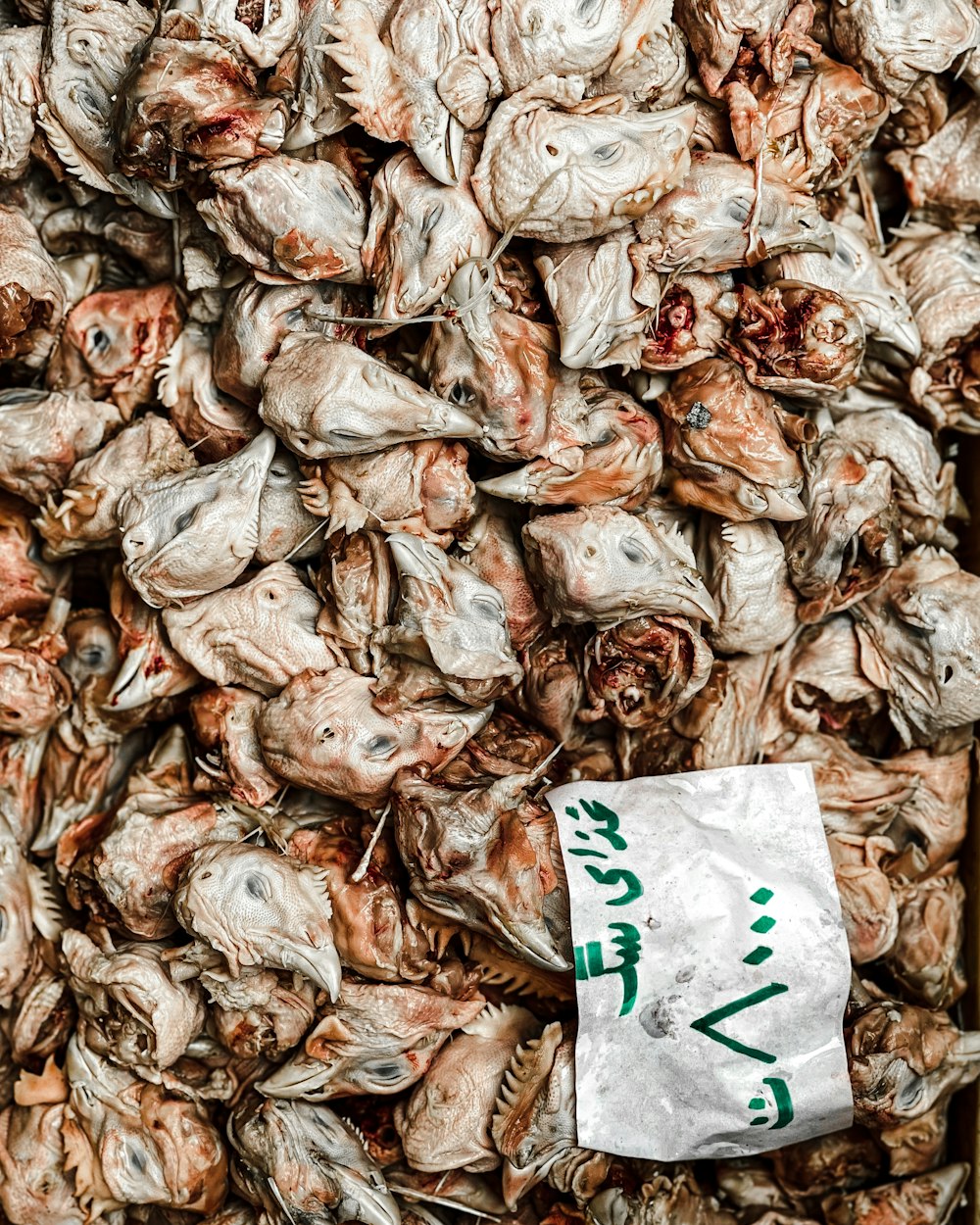 a pile of dried fish sitting on top of a table