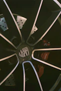Close-up of a forged aluminum 9rs wheel mounted on a Porsche GT3RS, highlighting the intricate CNC machining details.