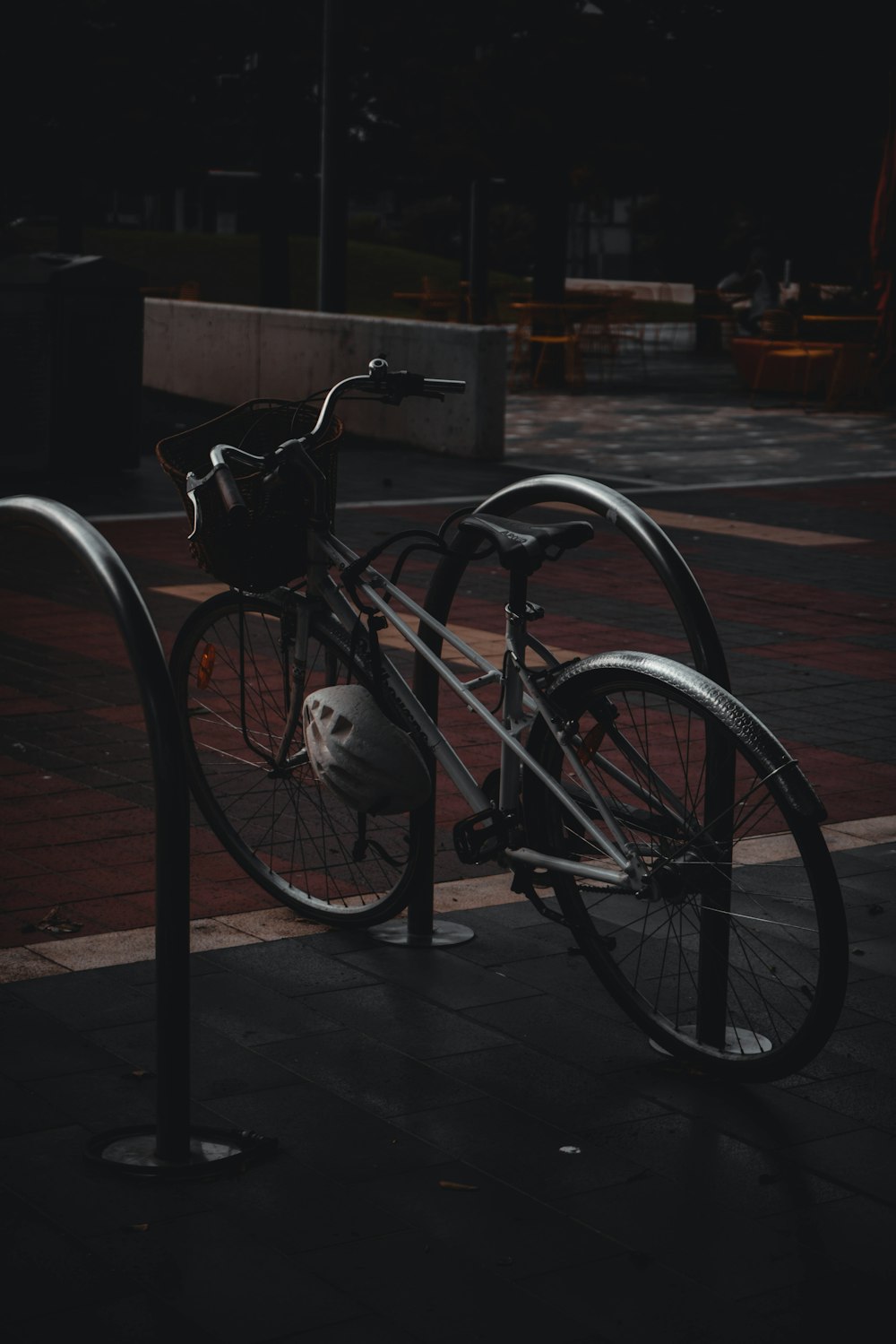 a bicycle parked on the side of the road