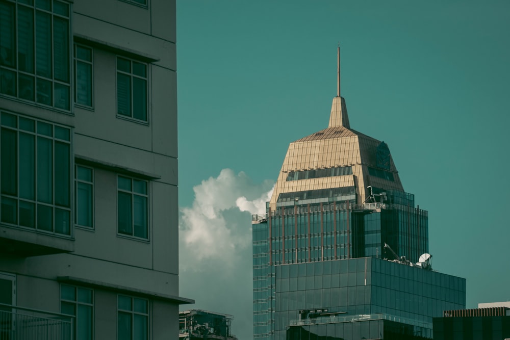 a tall building with a steeple on top of it