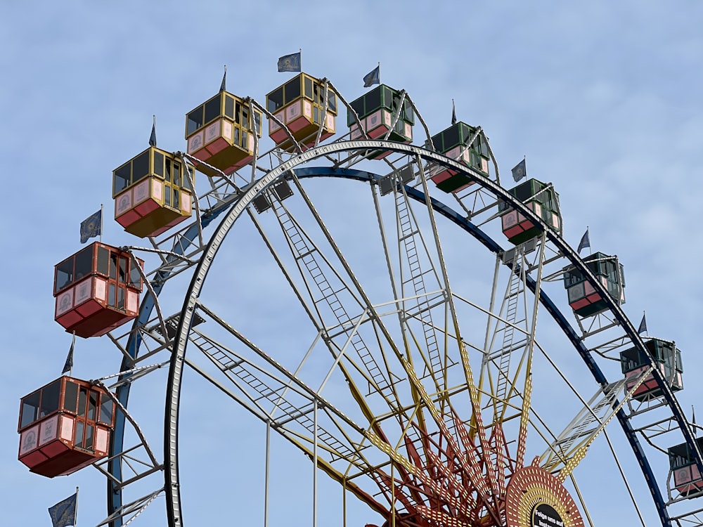 a large ferris wheel with a sky background