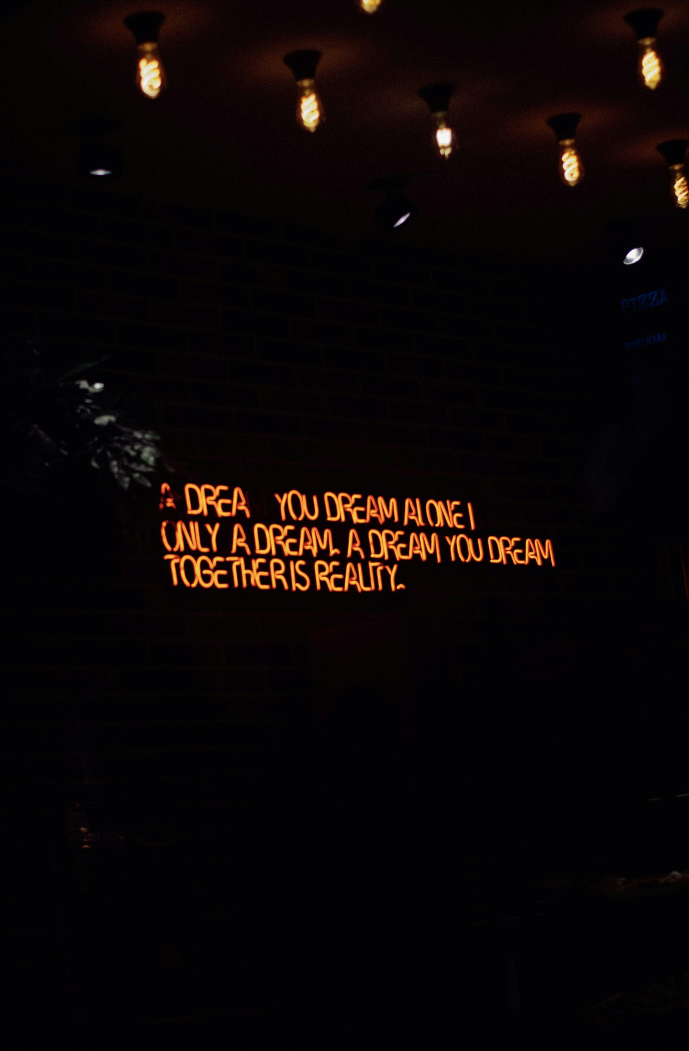 Neon quote on the wall