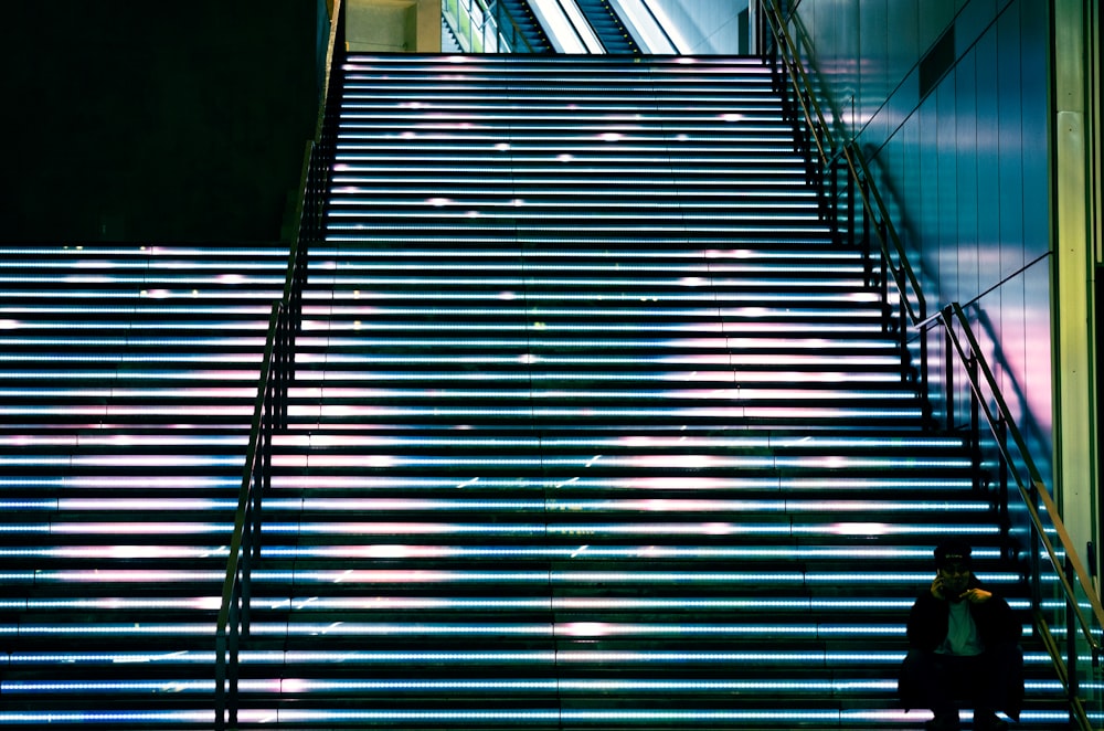 a person walking up a set of stairs