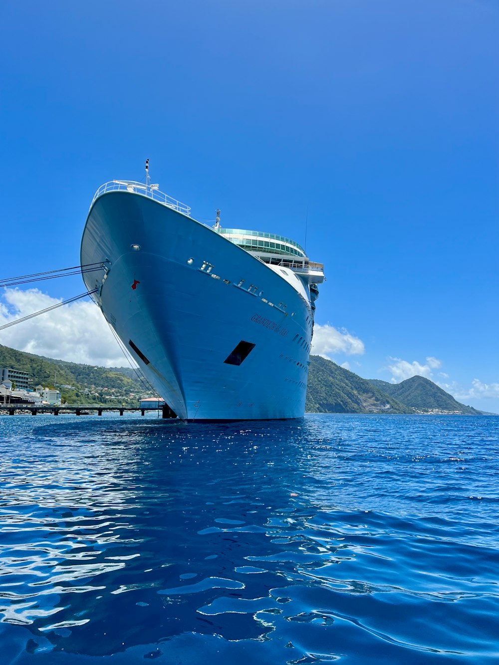 a large cruise ship in the middle of the ocean