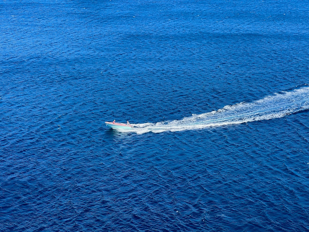 a boat in the middle of a body of water