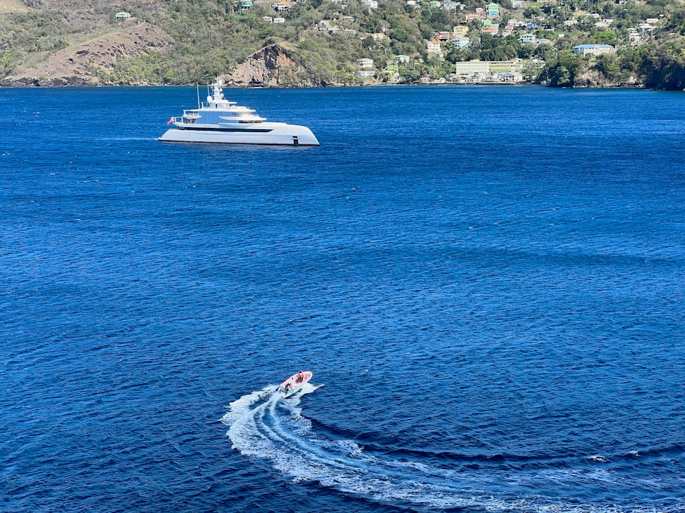 a boat is in the middle of a body of water