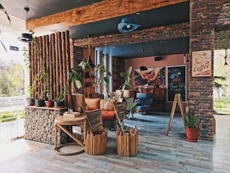 A cozy rustic-themed drink shop corner decorated with white batik patterns and natural wooden elements.