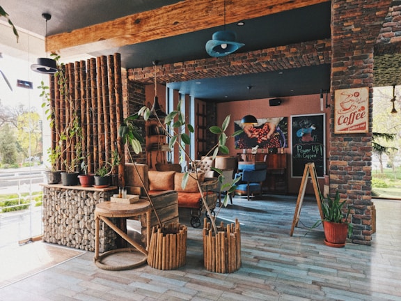 A cozy corner of rakizza with rustic decor, inviting guests to savor their coffee experience.