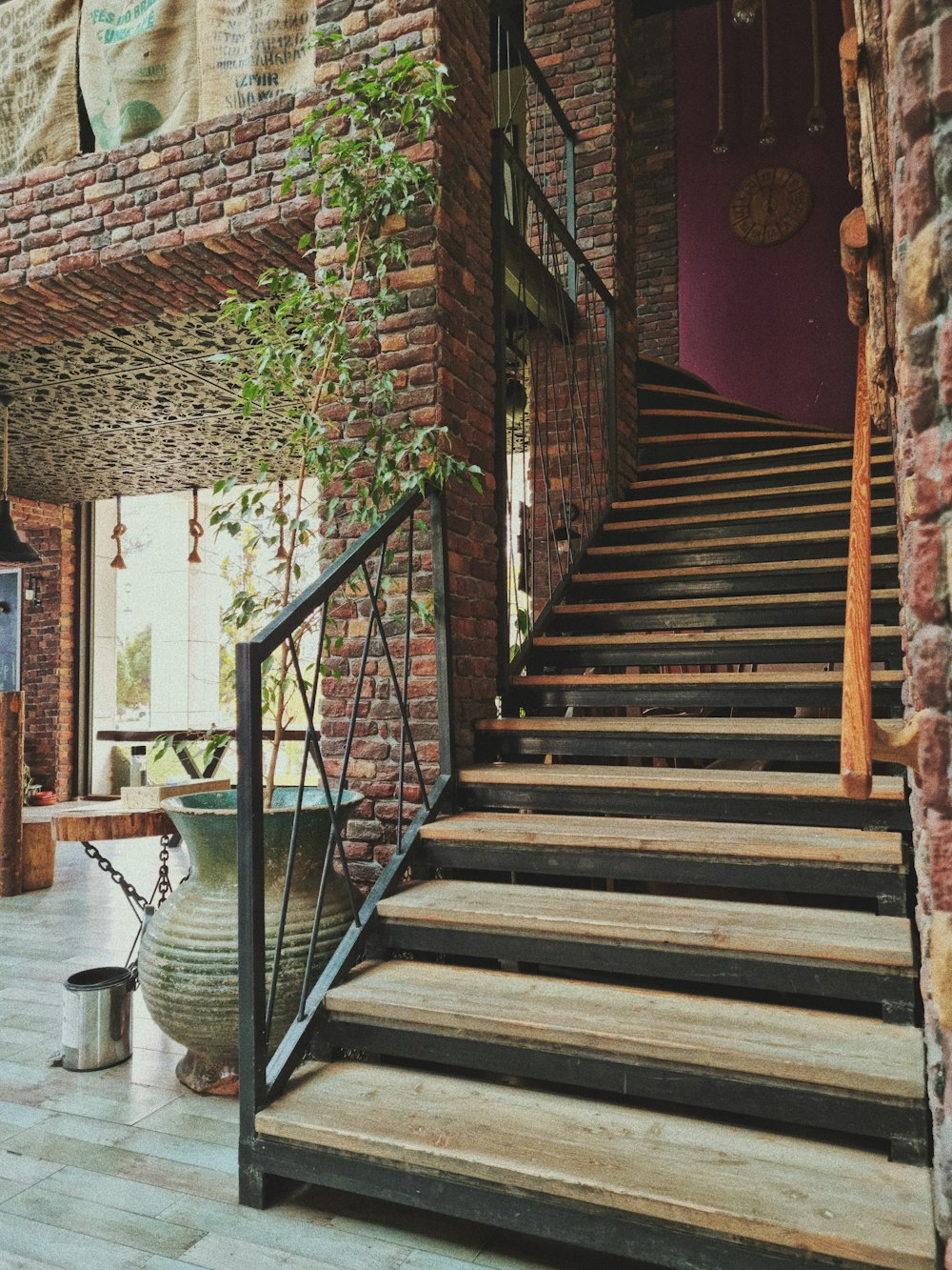 a set of stairs leading up to a brick building