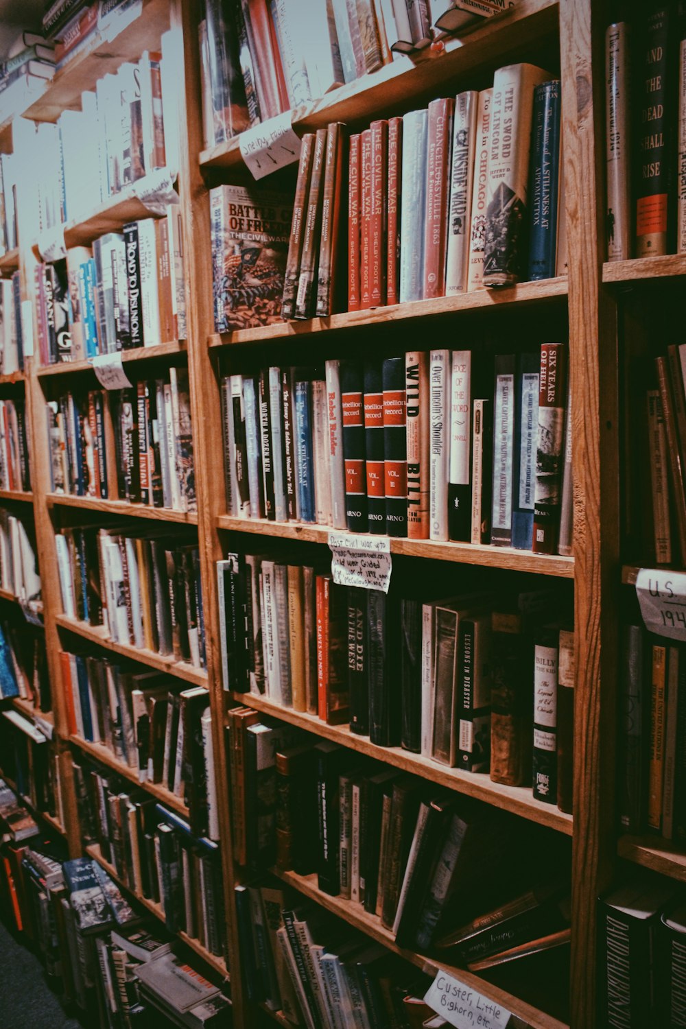 a book shelf filled with lots of books