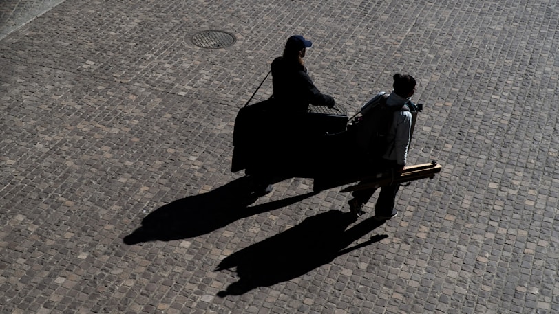 a couple of people riding on the back of a horse