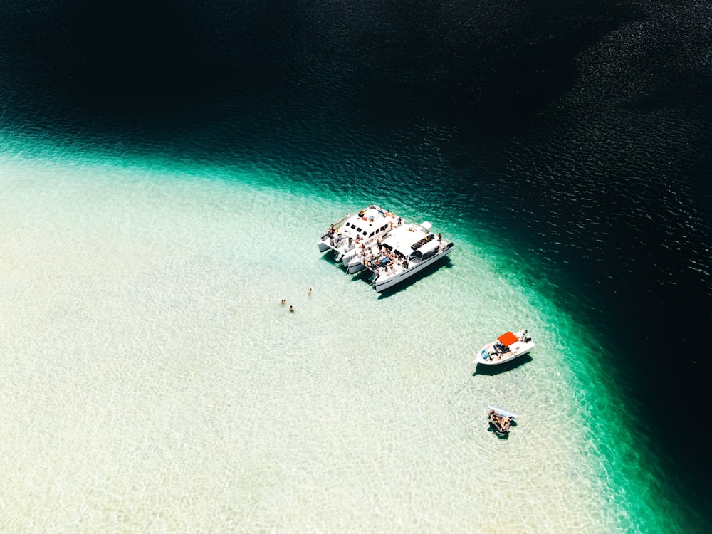 a boat floating on top of a body of water