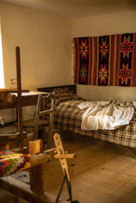 A bright, minimal room featuring a hand-woven rug from Studio Looms.
