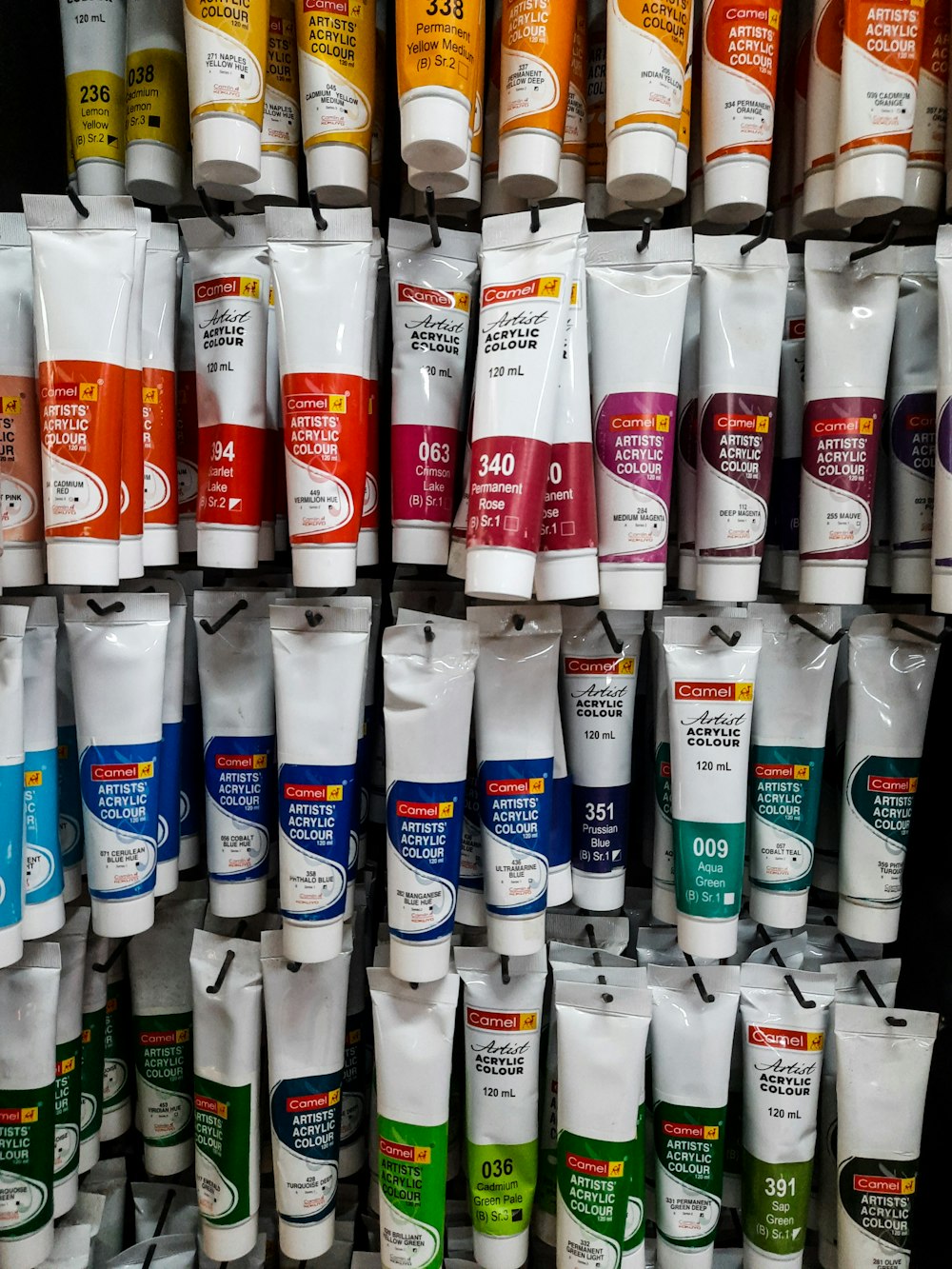 a large display of different types of toothpaste