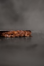 a close up of a piece of food on a table