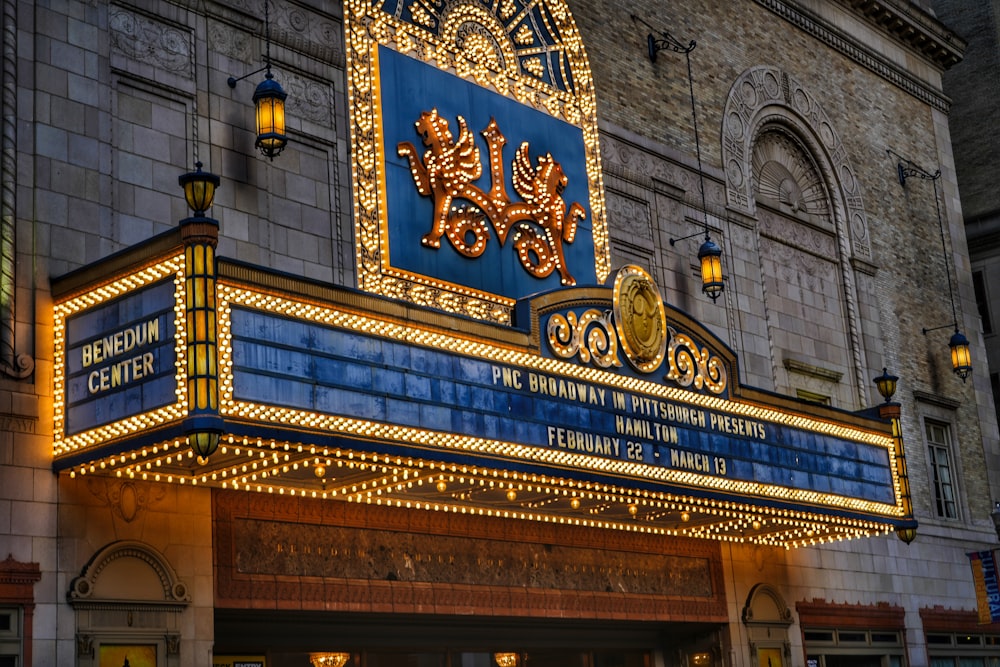 a theater marquee with lights on it's side