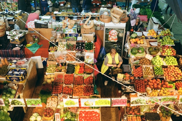 An overhead shot of a market stall filled with fresh produce.