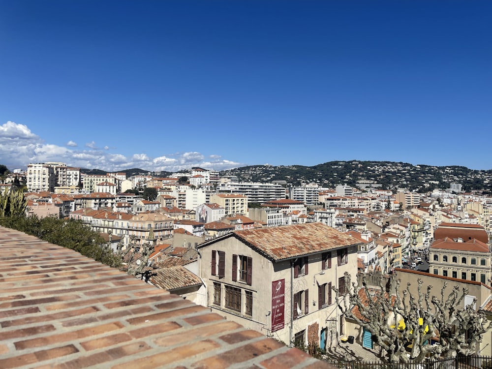 a view of a city from the top of a hill